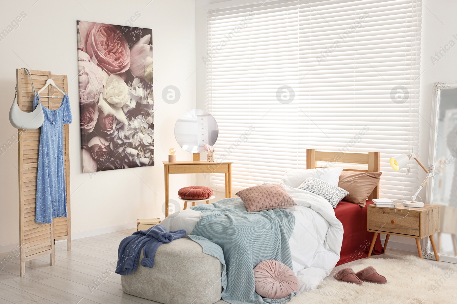 Photo of Teen's room interior with modern furniture and beautiful picture on wall