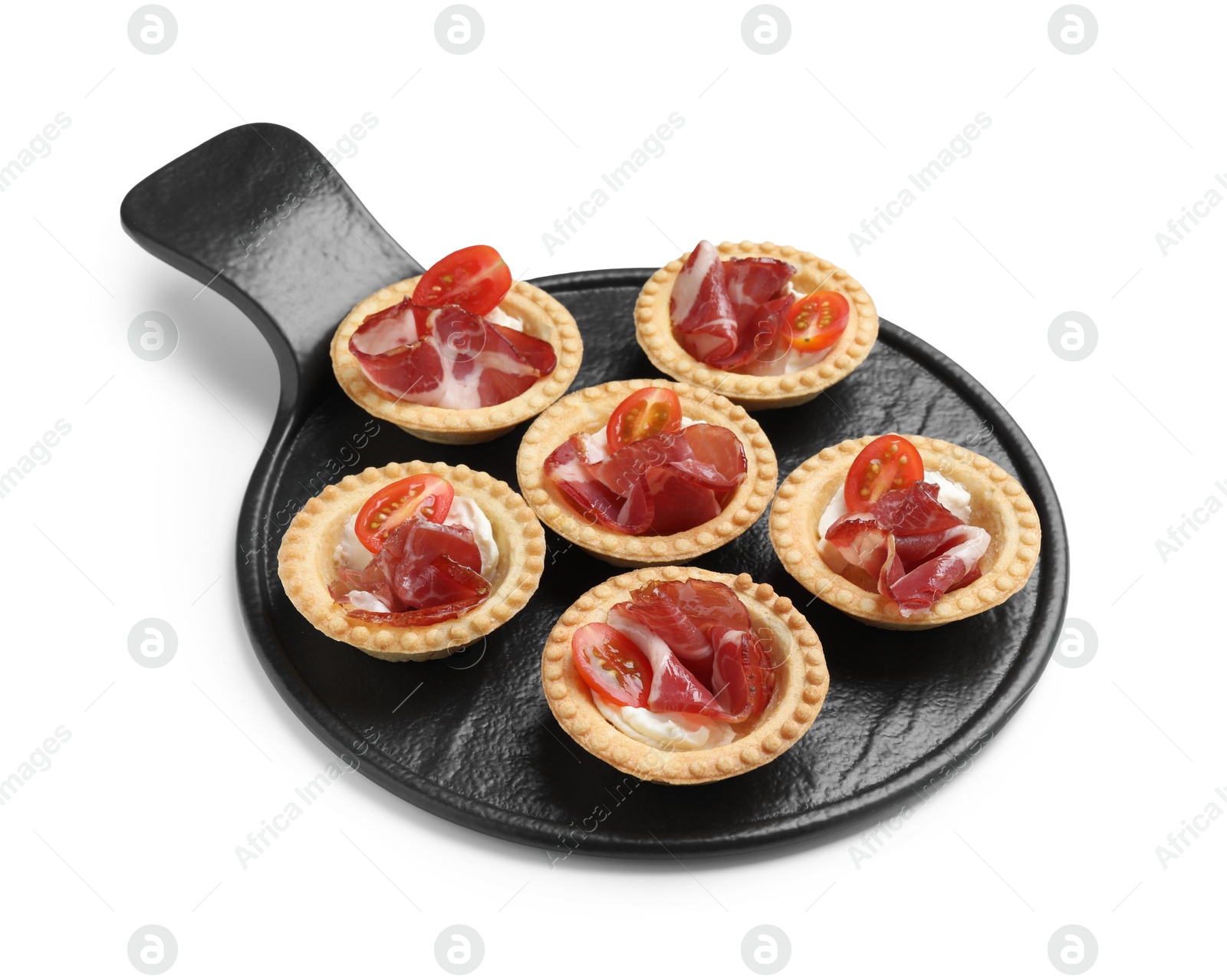 Photo of Delicious canapes with jamon, cream cheese and cherry tomatoes isolated on white