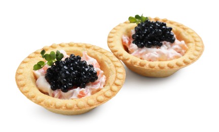 Photo of Delicious canapes with black caviar isolated on white