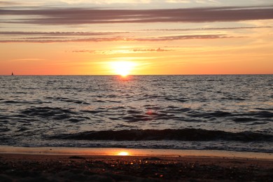 Photo of Picturesque view of sea at sunset. Tropical beach