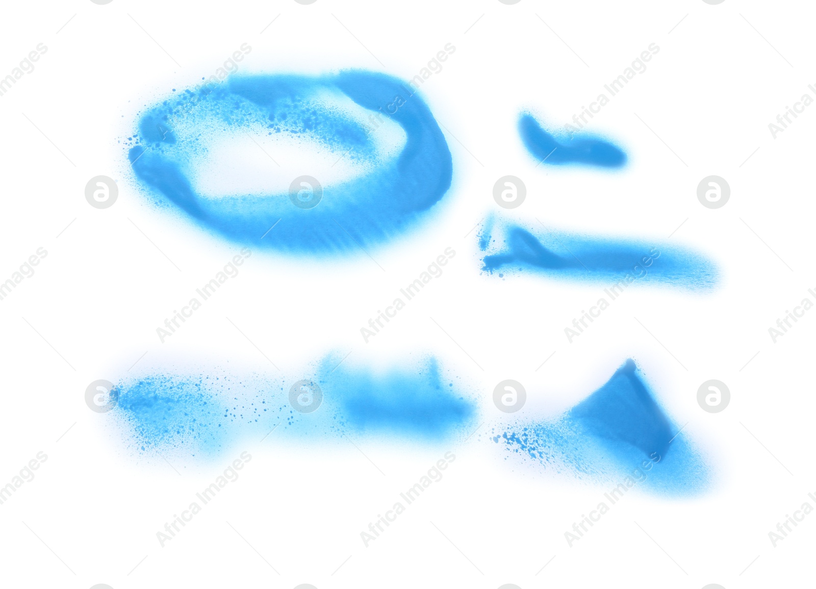 Photo of Abstract spots made with blue spray paint isolated on white, top view