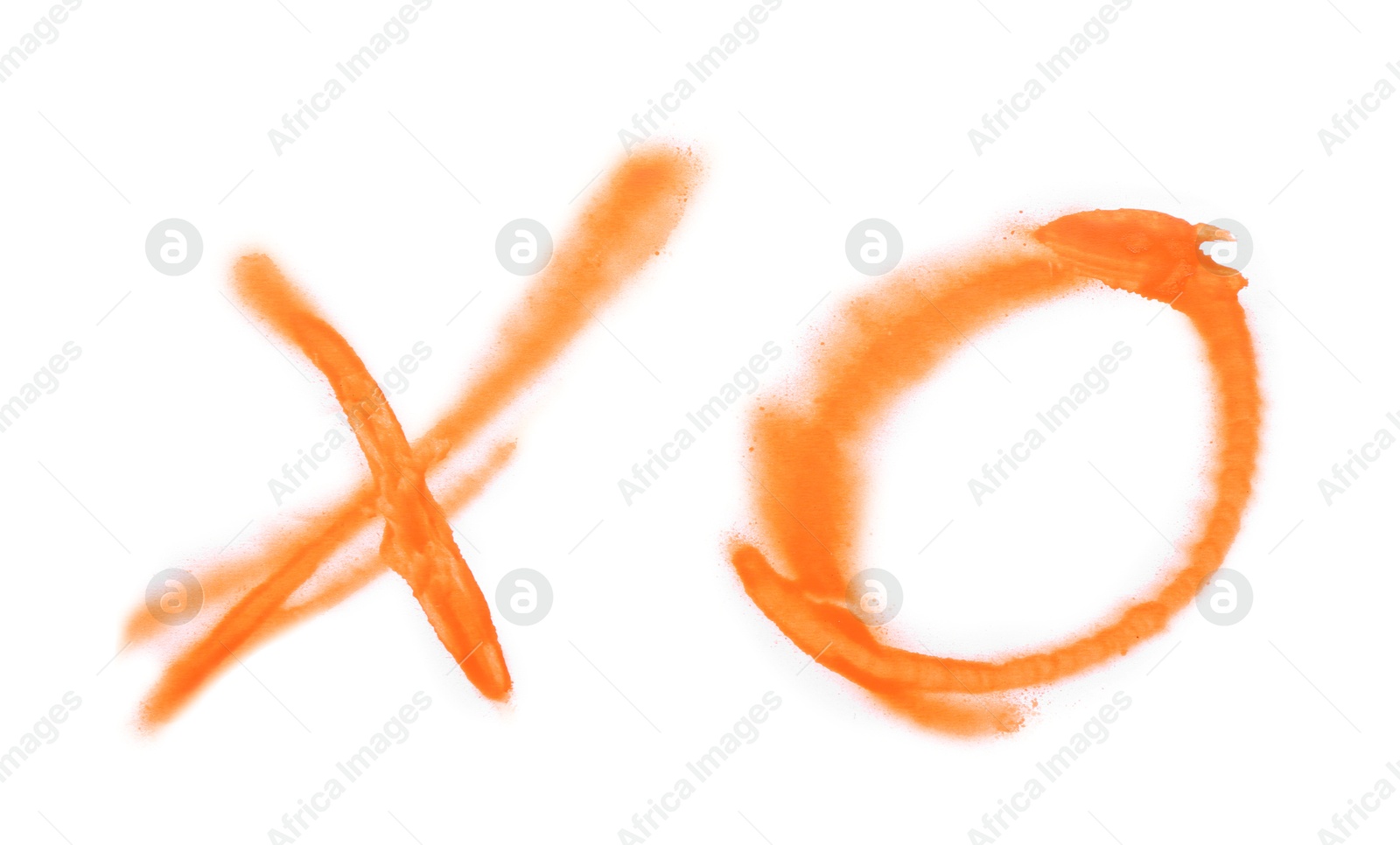 Photo of Crossed lines and circle drawn by orange spray paint isolated on white, top view