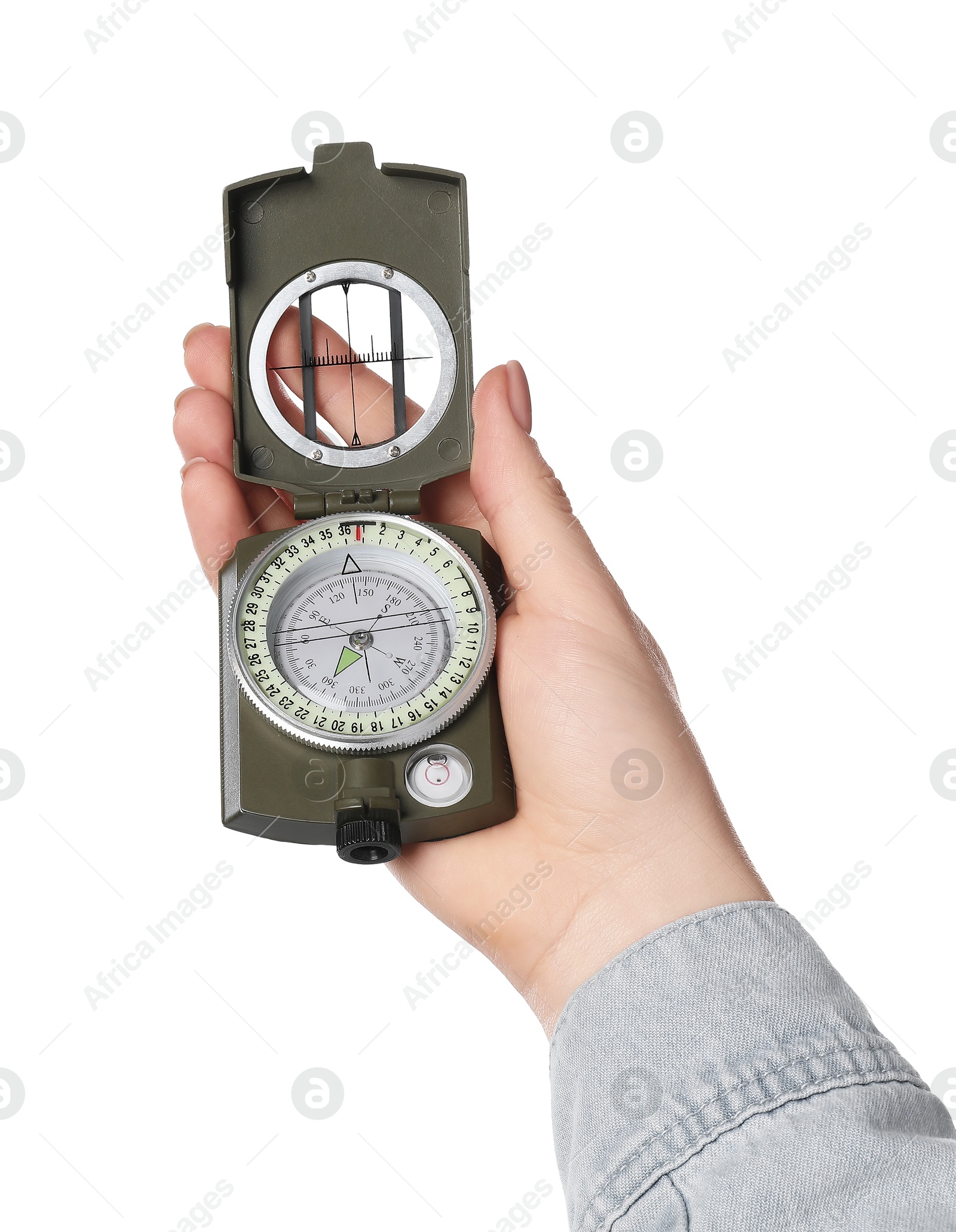 Photo of Woman holding compass on white background, closeup