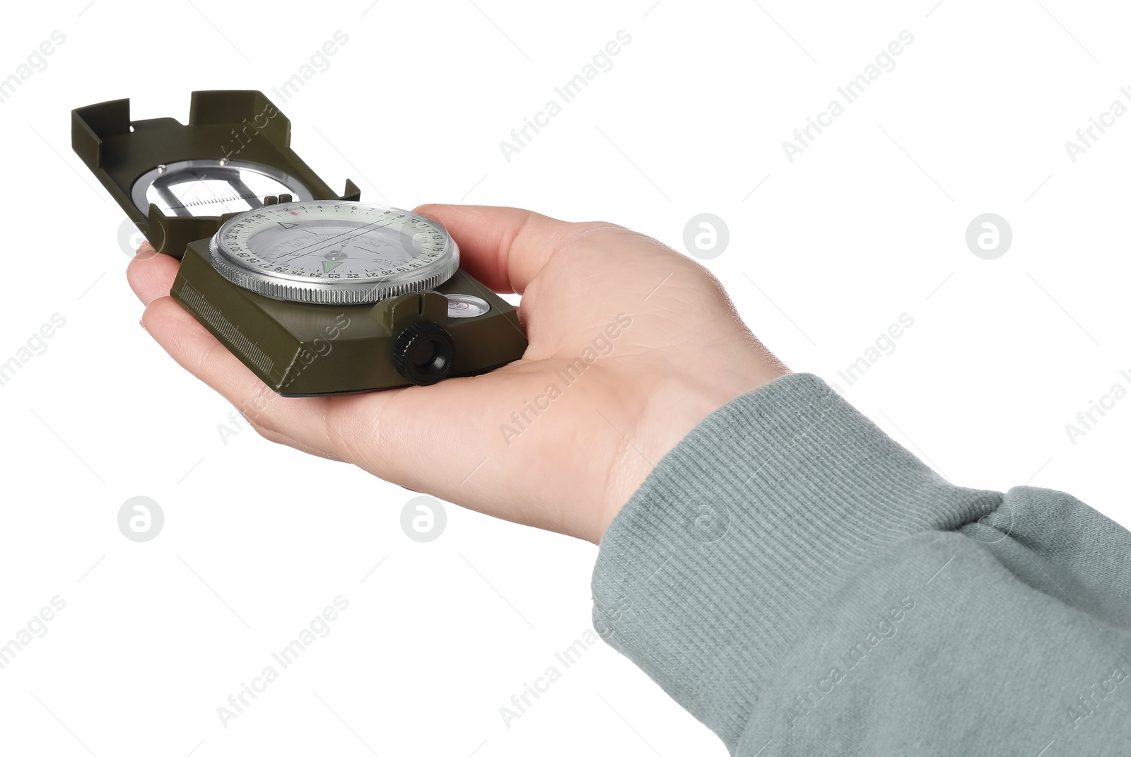 Photo of Woman holding compass on white background, closeup