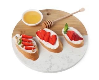 Delicious bruschetta with ricotta cheese, mint, walnuts, strawberries and honey isolated on white