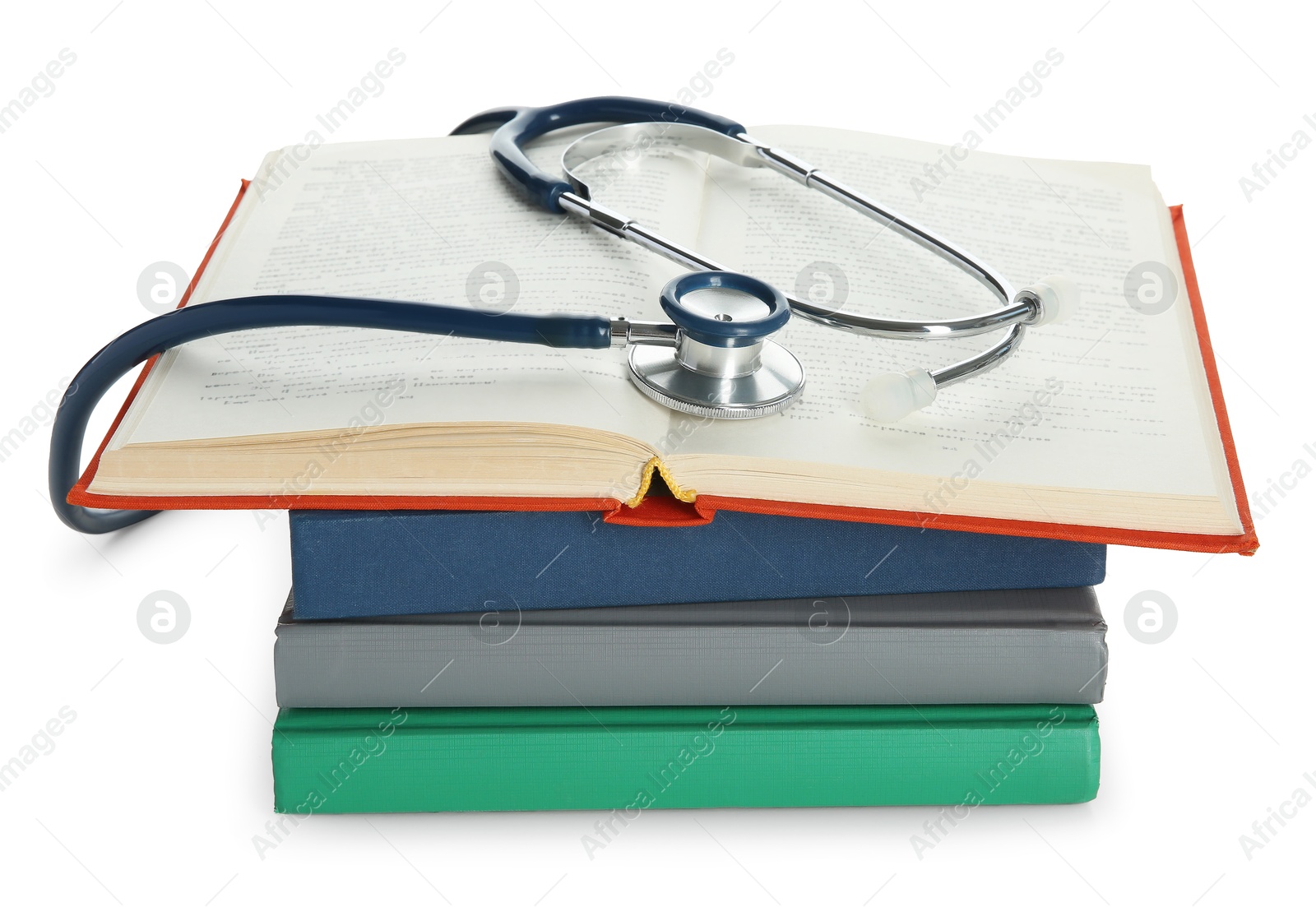 Photo of Stethoscope on stack of books against white background