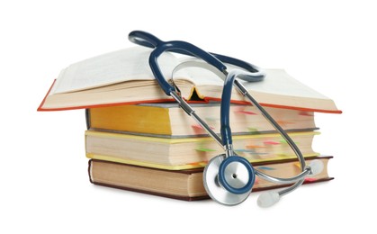 Photo of Stethoscope on stack of books against white background