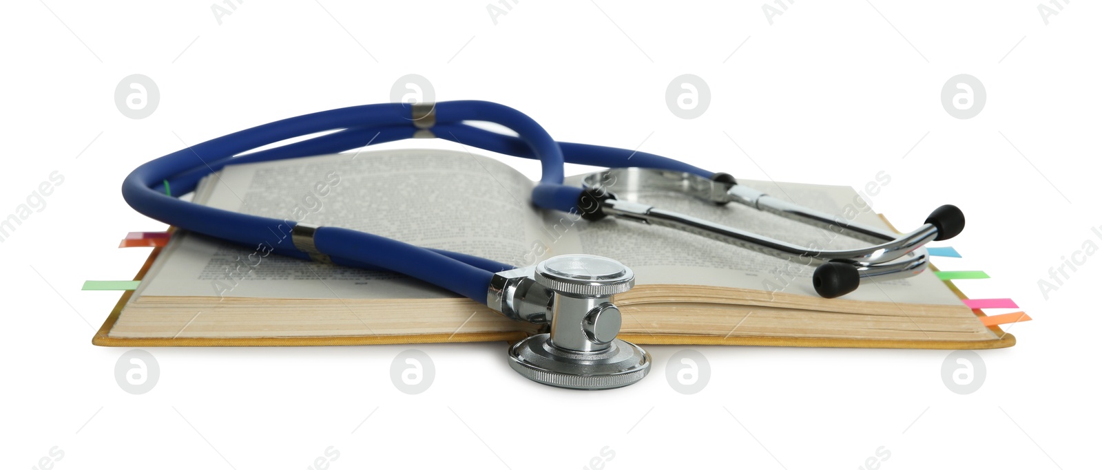 Photo of Stethoscope and open book isolated on white