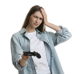 Photo of Unhappy woman with controller on white background