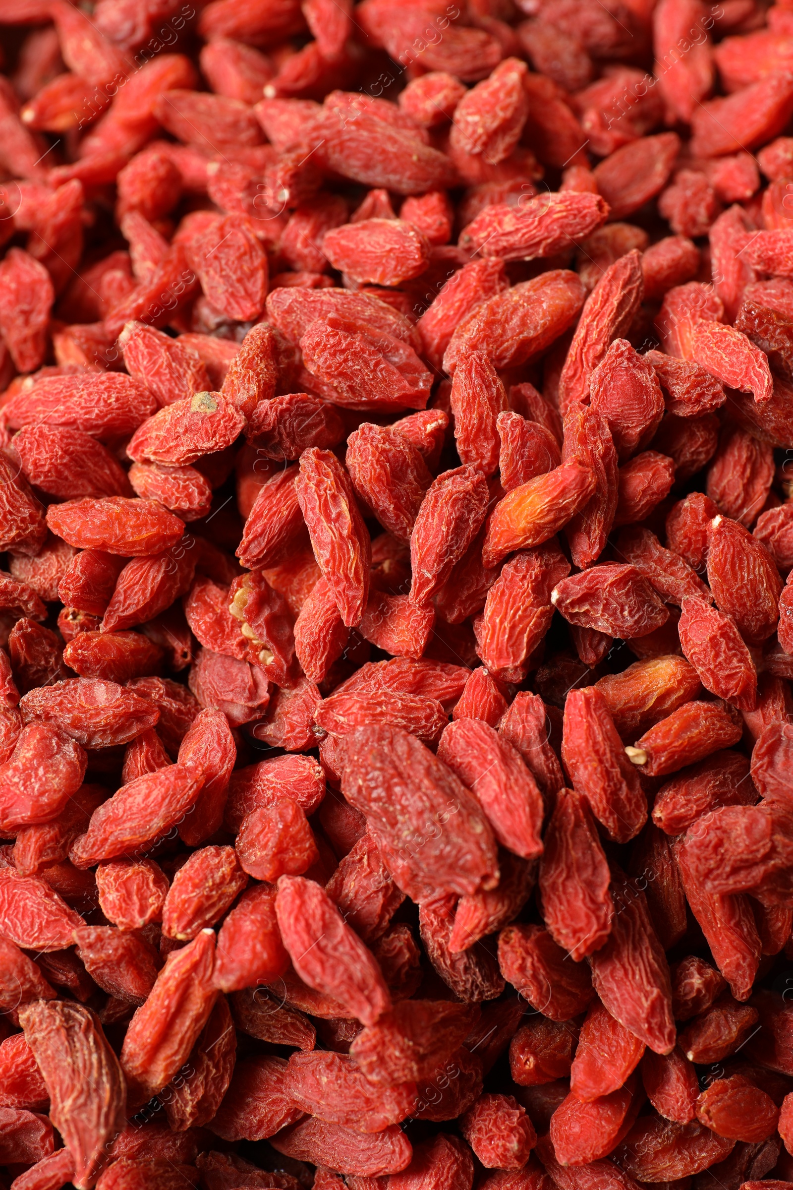 Photo of Dried goji berries as background, above view