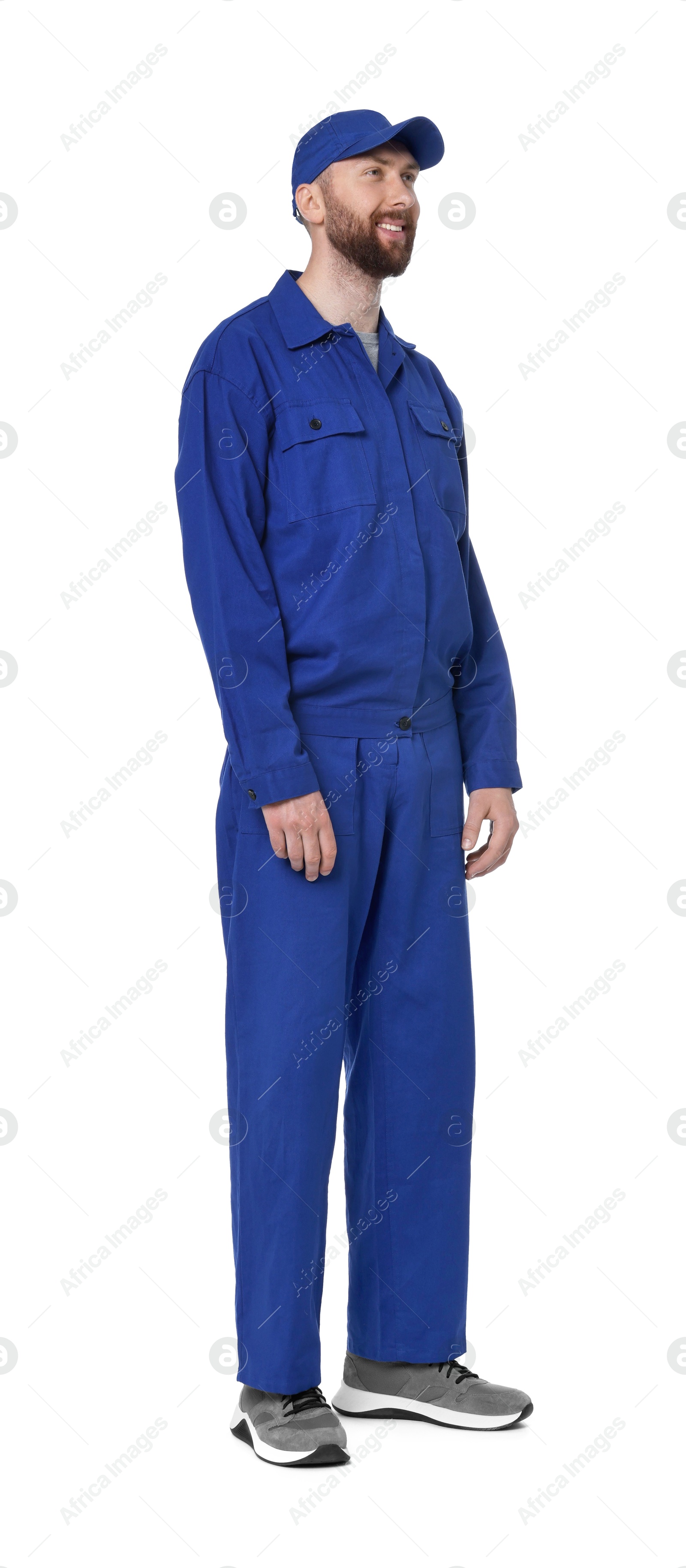 Photo of Professional auto mechanic in blue uniform on white background