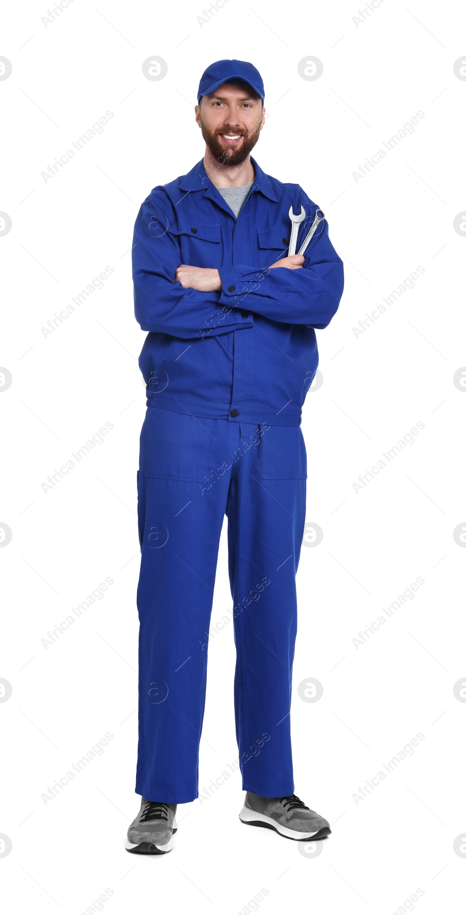 Photo of Professional auto mechanic with tools on white background