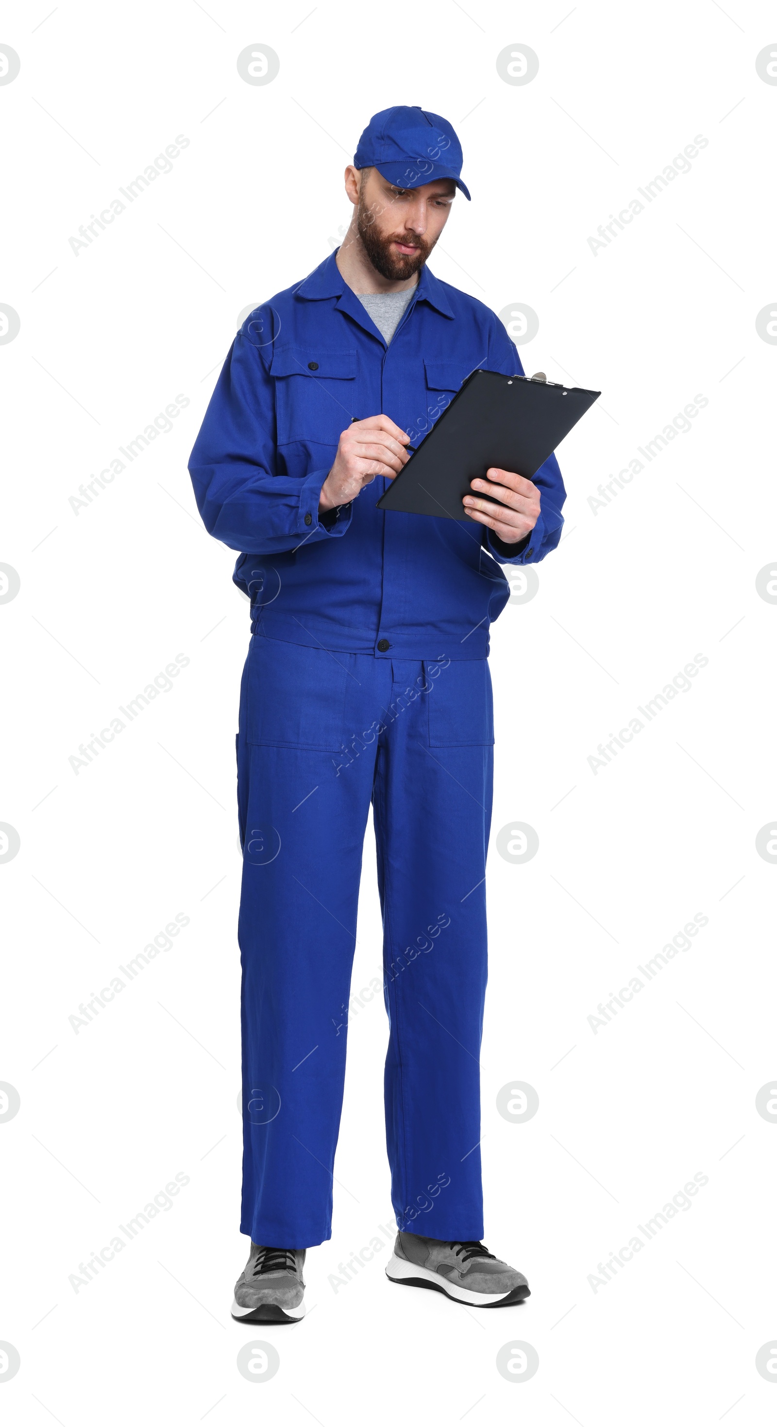 Photo of Professional auto mechanic with clipboard and pen on white background