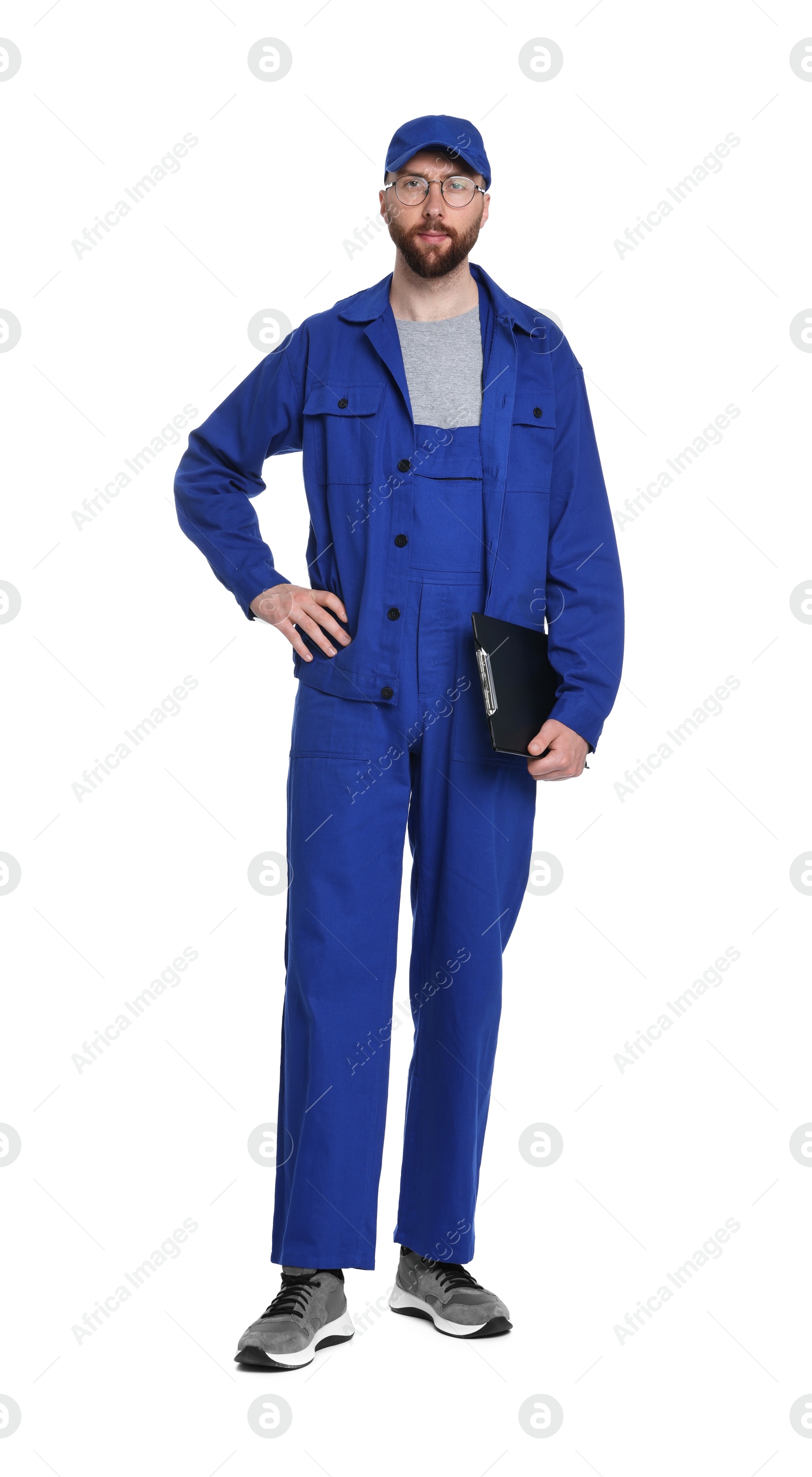 Photo of Professional auto mechanic with clipboard on white background