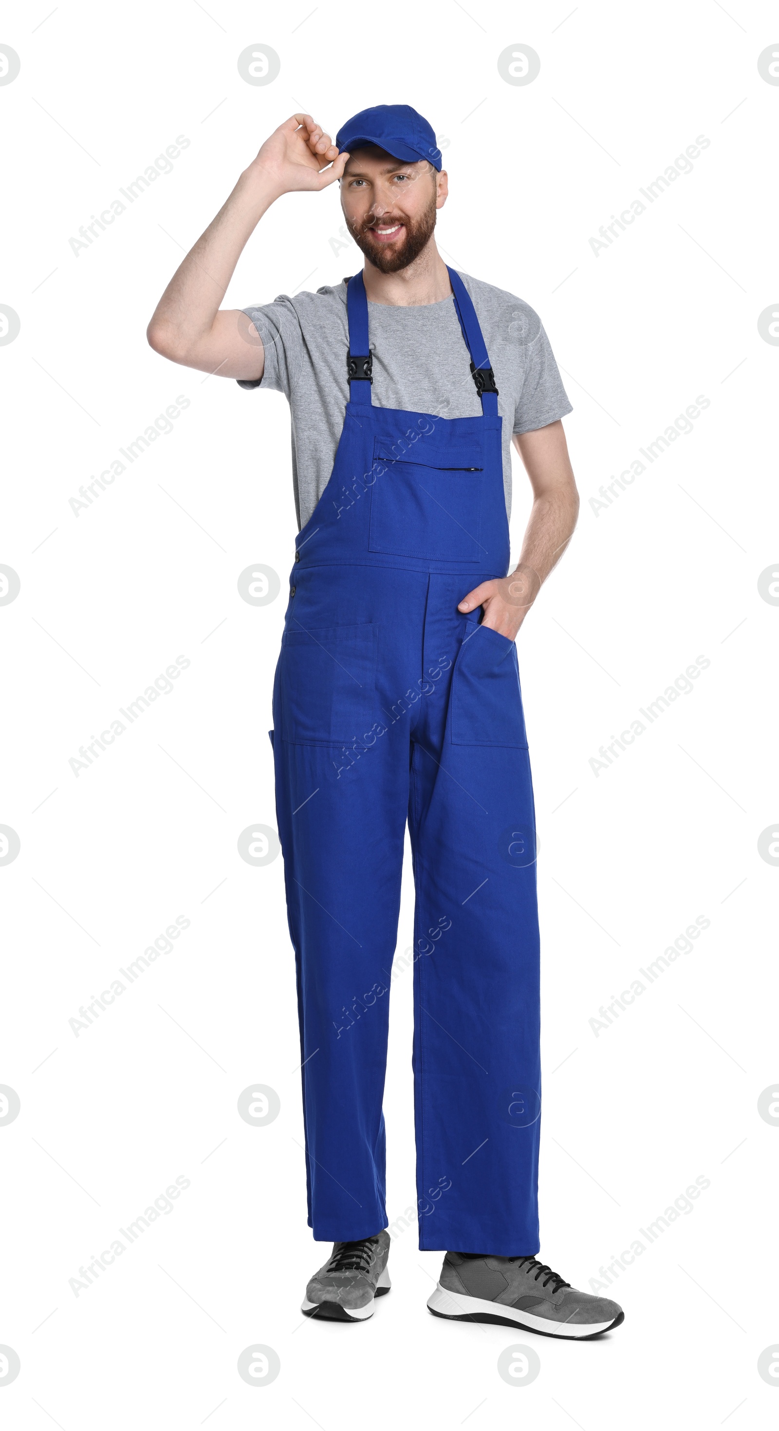 Photo of Professional auto mechanic in uniform on white background