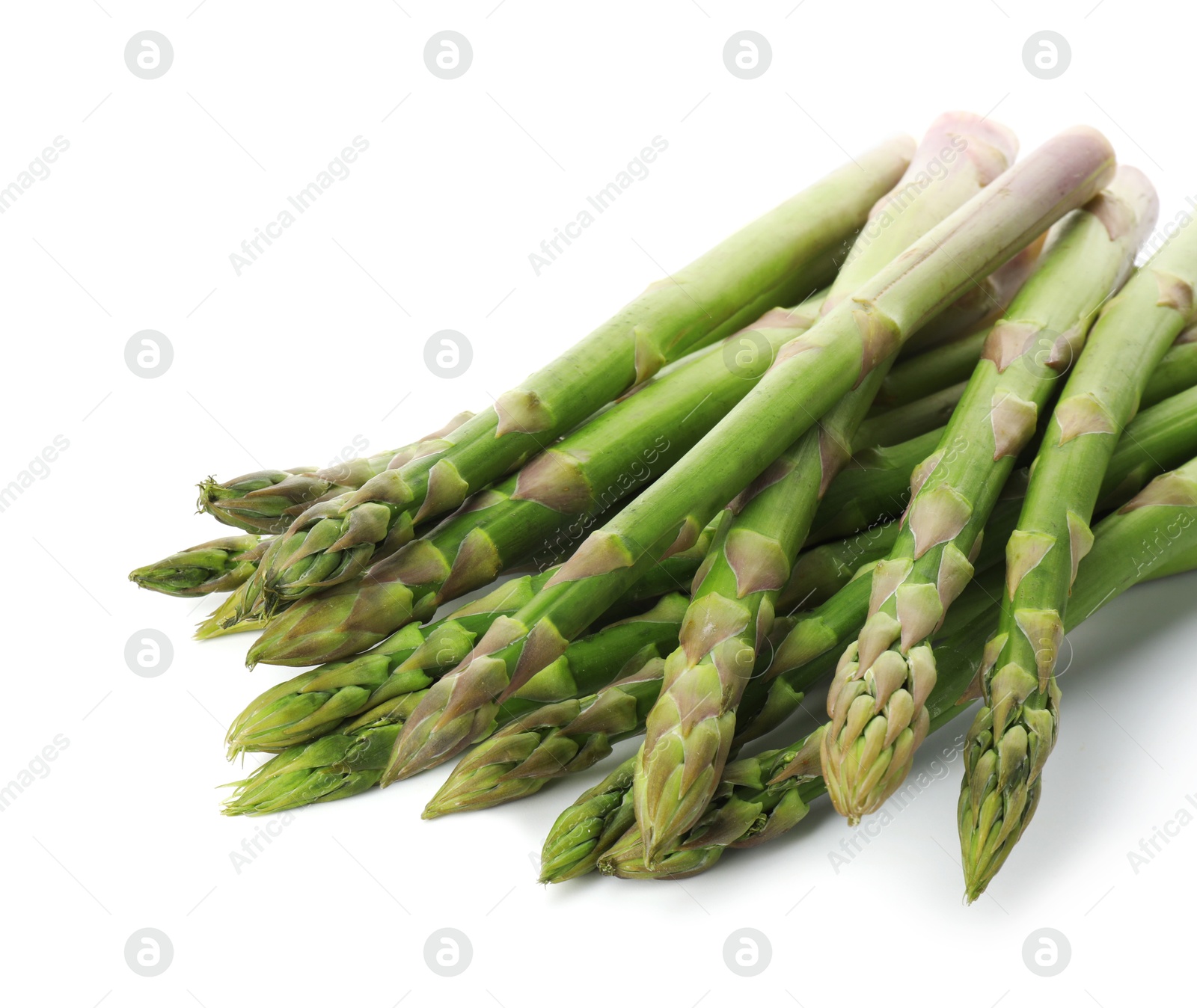 Photo of Fresh green asparagus stems isolated on white