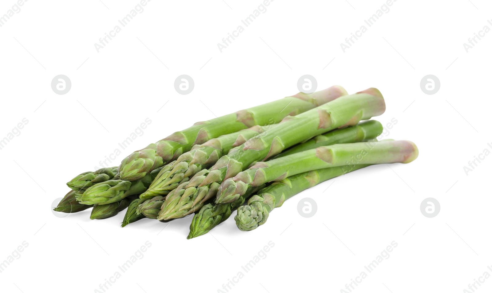 Photo of Fresh green asparagus stems isolated on white