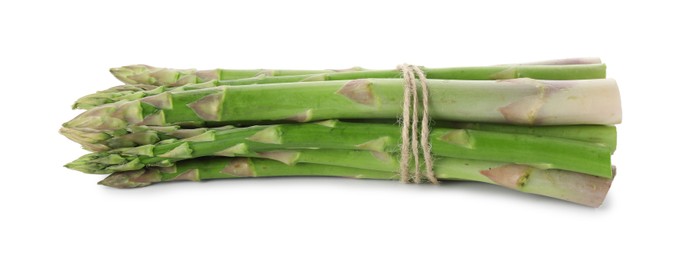 Photo of Bunch of fresh green asparagus stems isolated on white