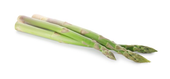 Photo of Fresh green asparagus stems isolated on white