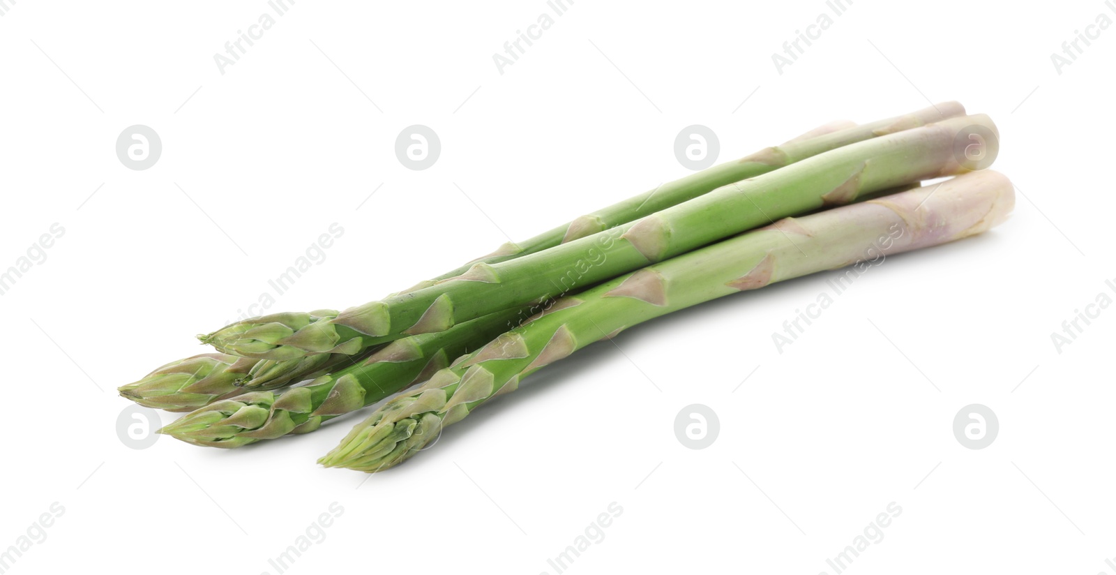 Photo of Fresh green asparagus stems isolated on white