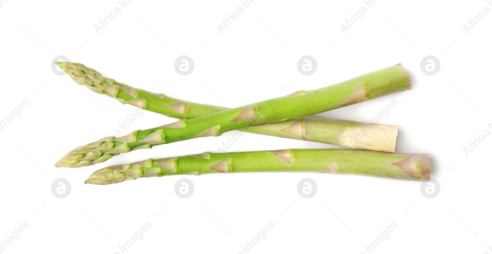 Photo of Fresh green asparagus stems isolated on white, top view