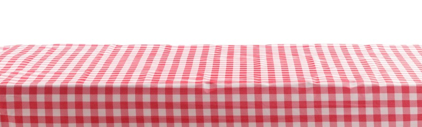 Picnic tablecloth on table against white background