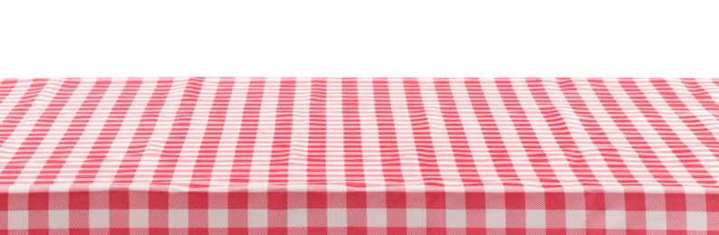 Picnic tablecloth on table against white background