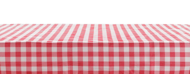 Picnic tablecloth on table against white background