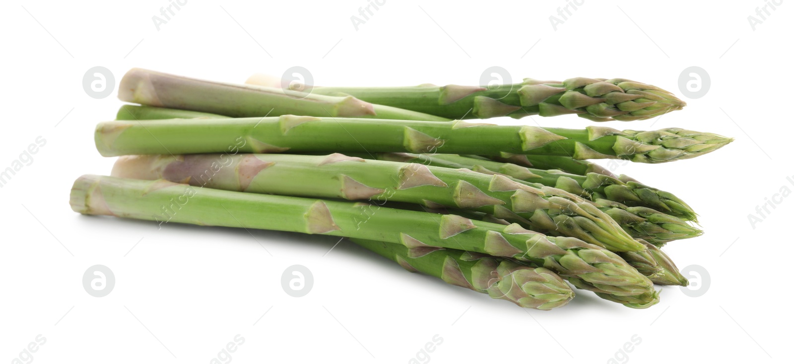 Photo of Fresh green asparagus stems isolated on white