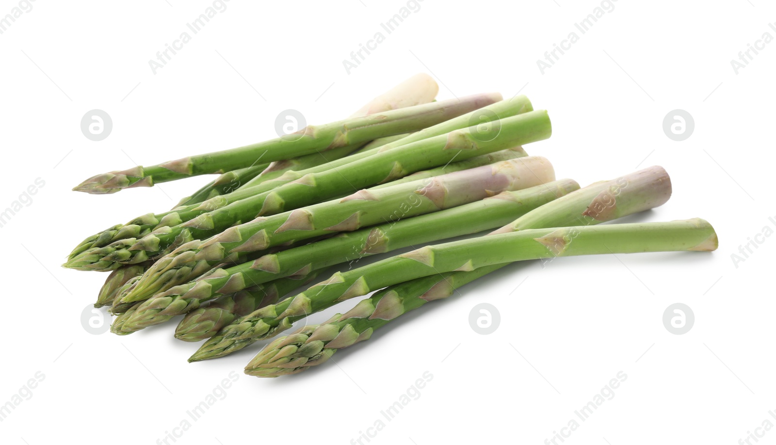 Photo of Fresh green asparagus stems isolated on white