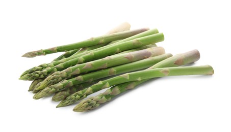 Photo of Fresh green asparagus stems isolated on white