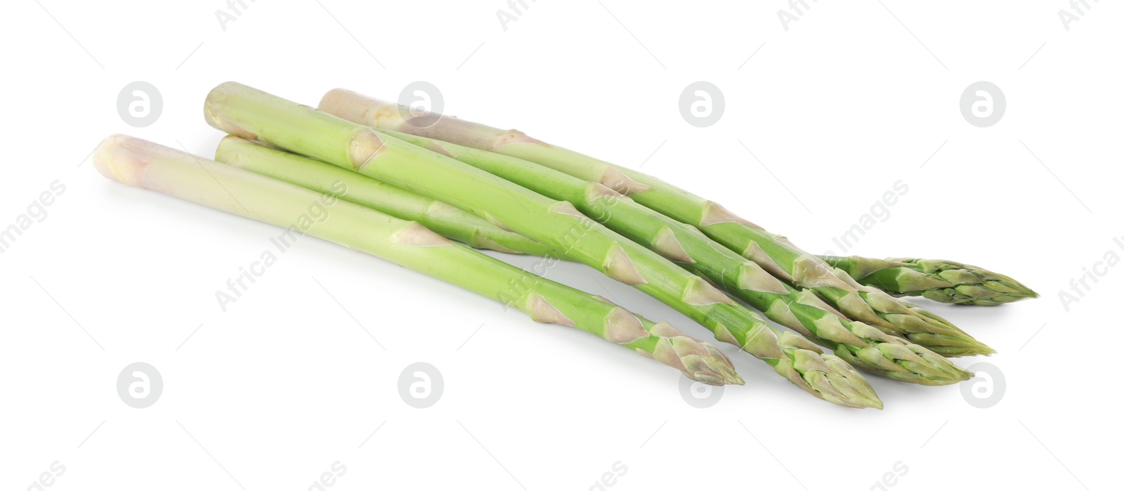 Photo of Fresh green asparagus stems isolated on white