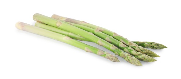 Photo of Fresh green asparagus stems isolated on white