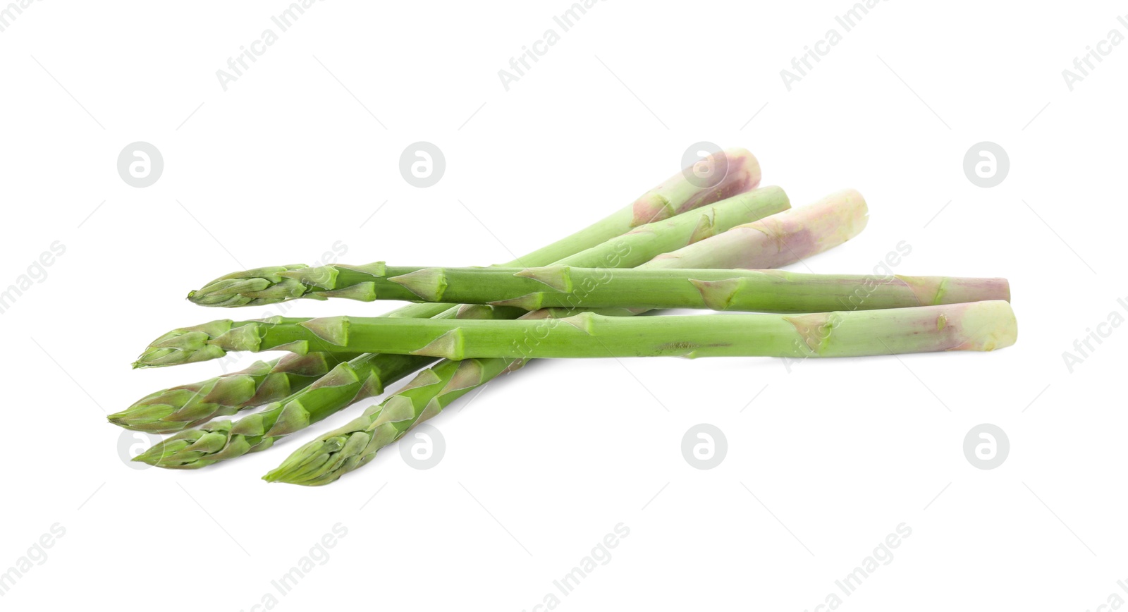 Photo of Fresh green asparagus stems isolated on white