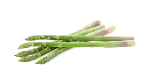 Photo of Fresh green asparagus stems isolated on white