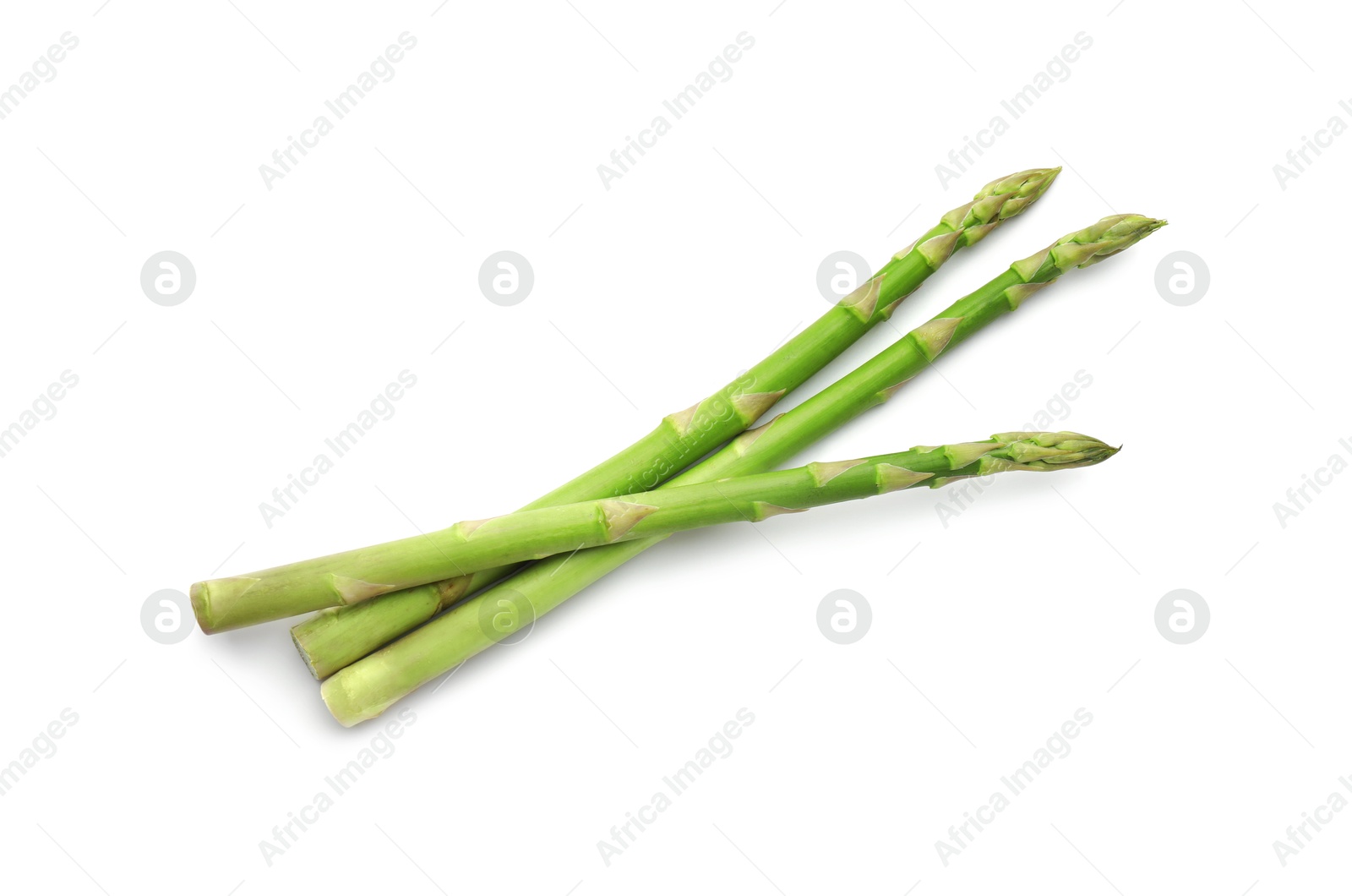 Photo of Fresh green asparagus stems isolated on white, top view