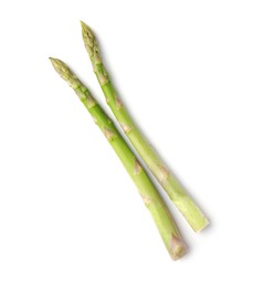 Photo of Fresh green asparagus stems isolated on white, top view