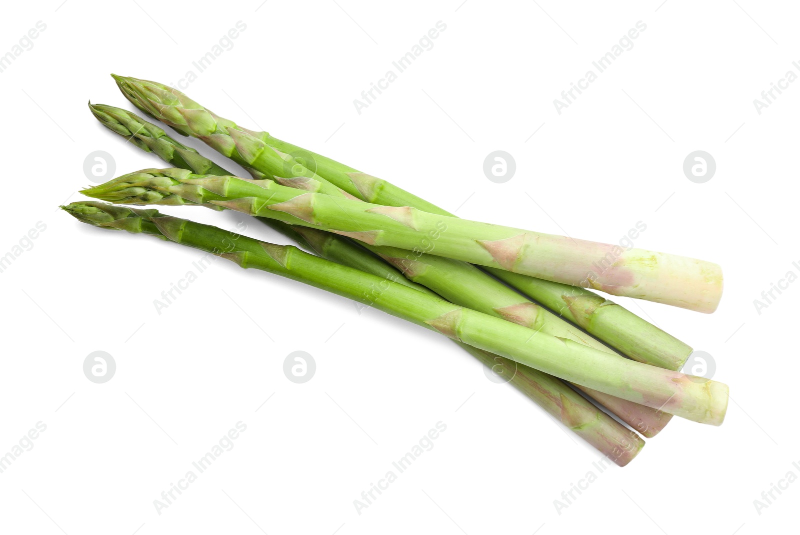 Photo of Fresh green asparagus stems isolated on white, top view