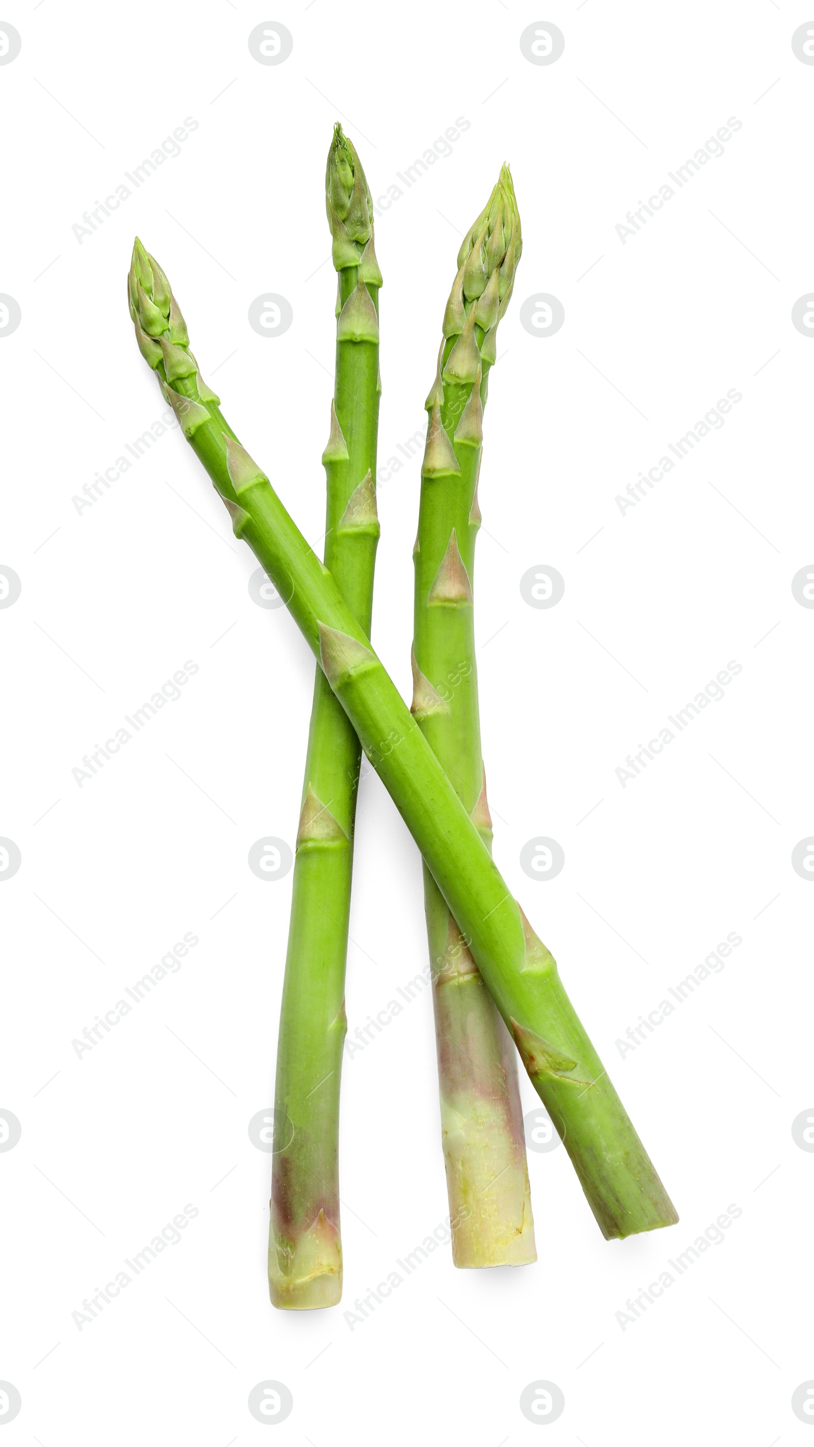 Photo of Fresh green asparagus stems isolated on white, top view