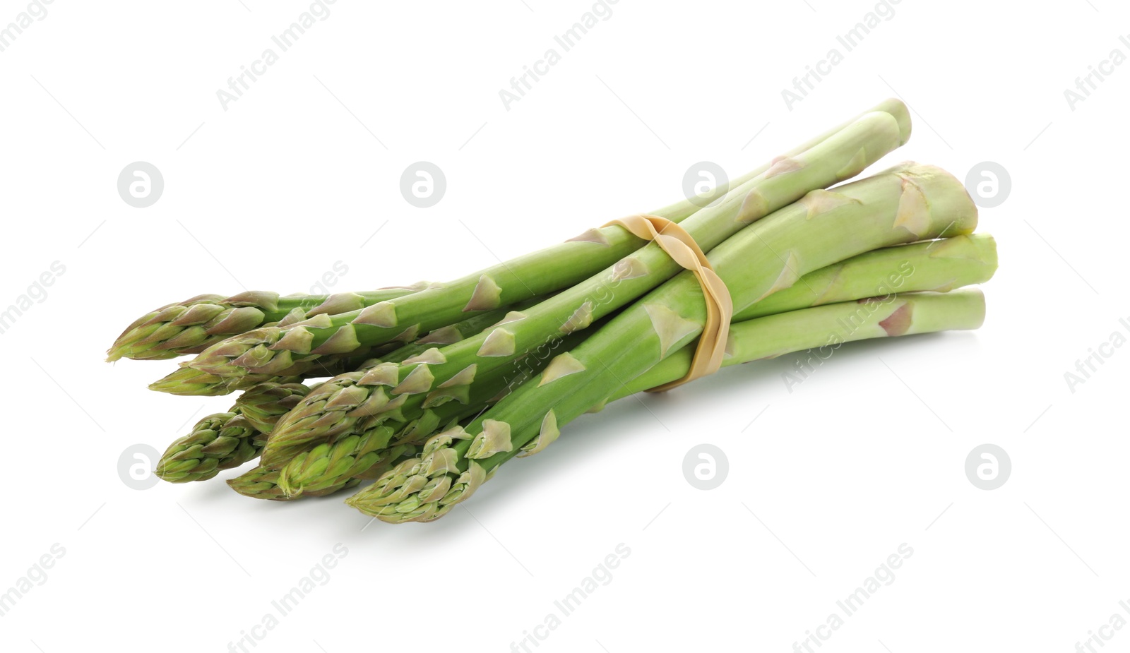 Photo of Many fresh green asparagus stems isolated on white