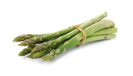 Photo of Many fresh green asparagus stems isolated on white