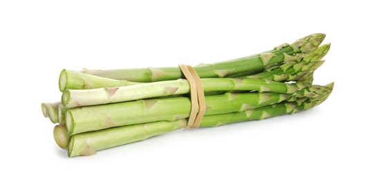 Photo of Many fresh green asparagus stems isolated on white