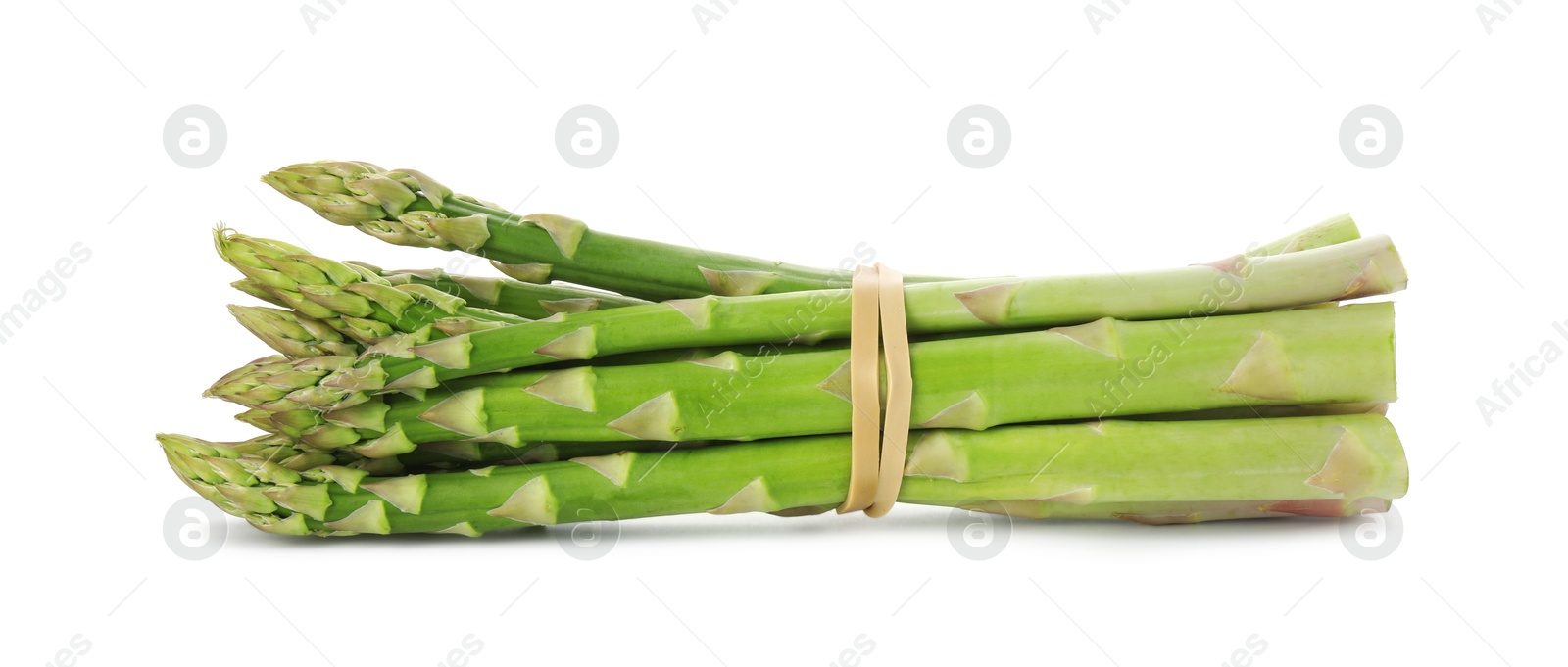 Photo of Many fresh green asparagus stems isolated on white