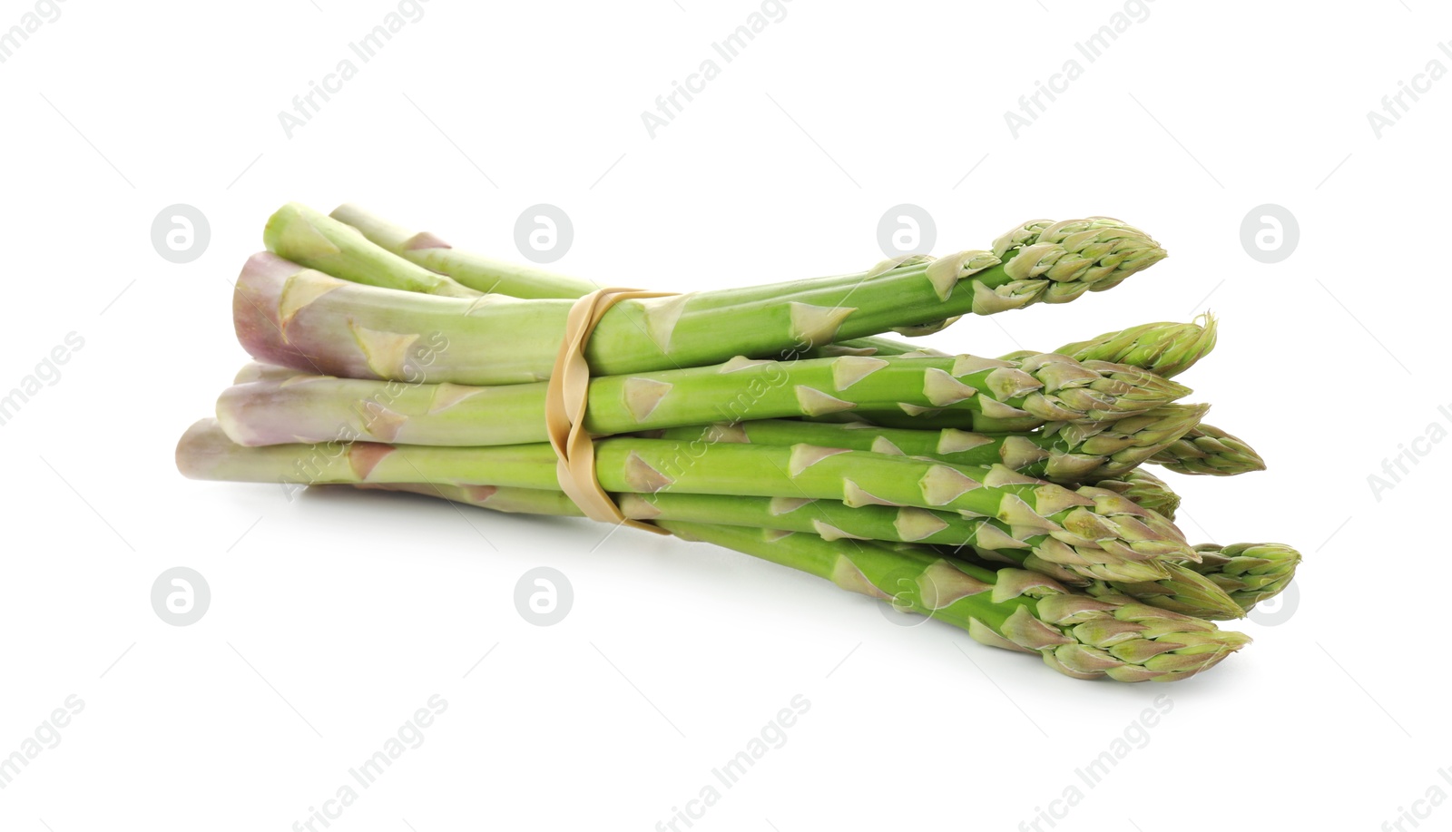 Photo of Many fresh green asparagus stems isolated on white