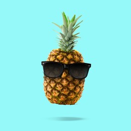 Image of Summer vibe. Pineapple with sunglasses on turquoise background. Party flyer or other seasonal