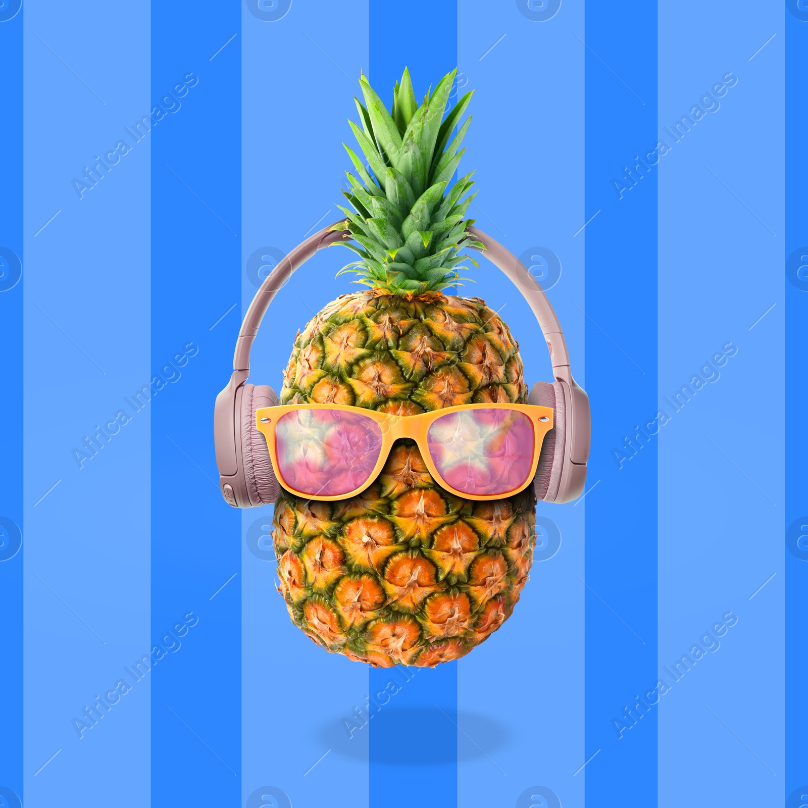 Image of Summer vibe. Pineapple with sunglasses and headphones on blue striped background. Party flyer or other seasonal