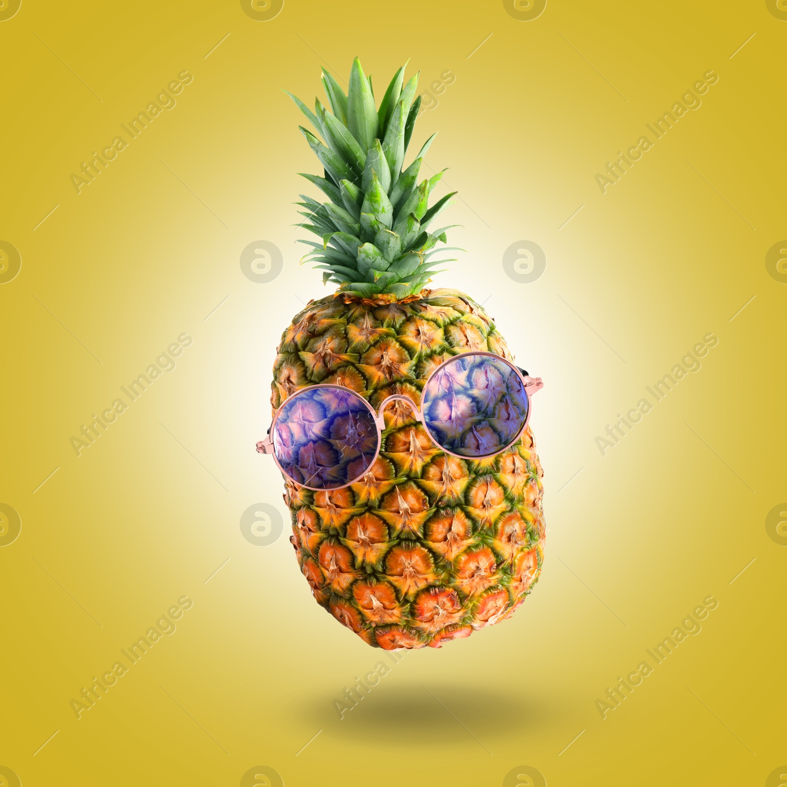 Image of Summer vibe. Pineapple with sunglasses on golden background. Party flyer or other seasonal