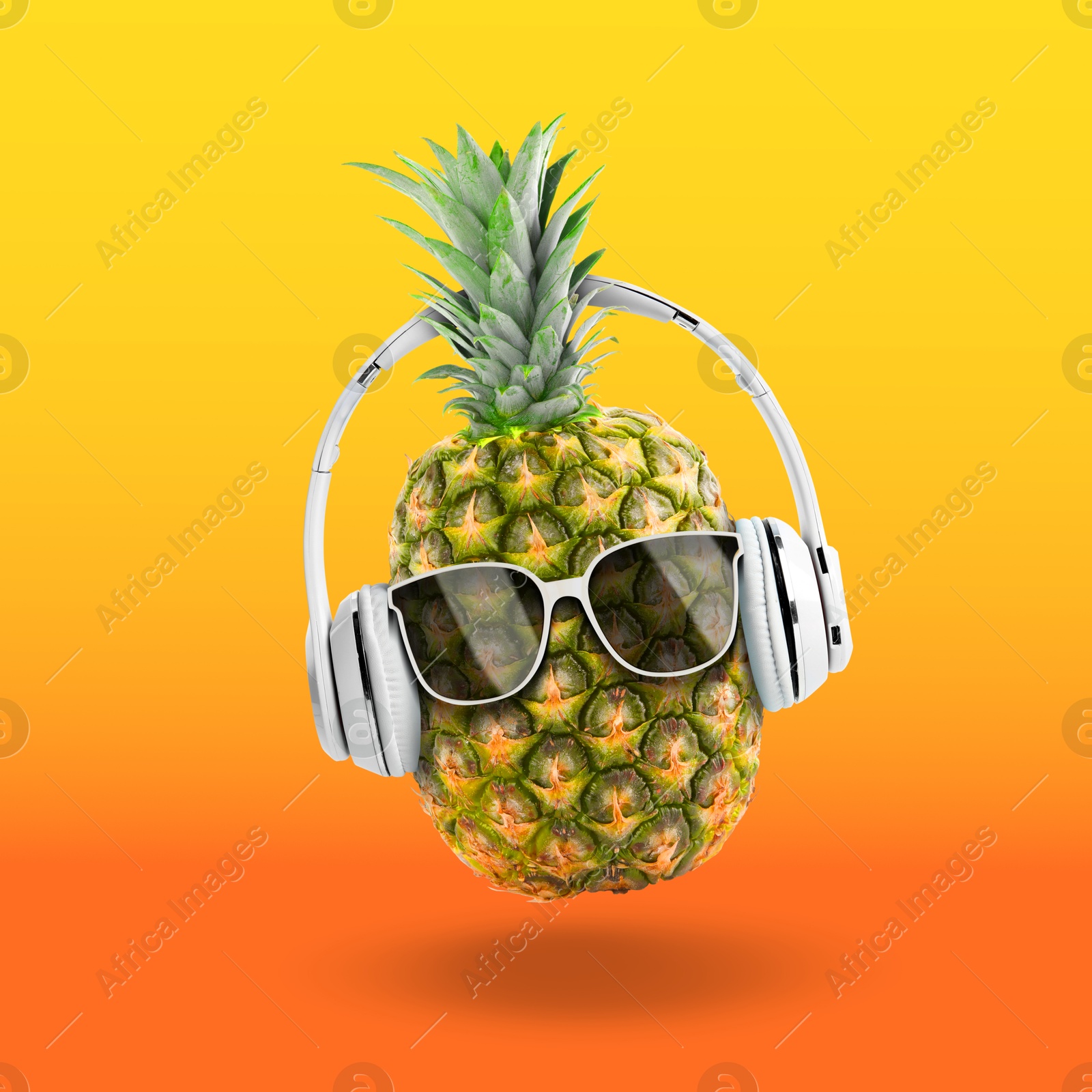 Image of Summer vibe. Pineapple with sunglasses and headphones on color gradient background. Party flyer or other seasonal