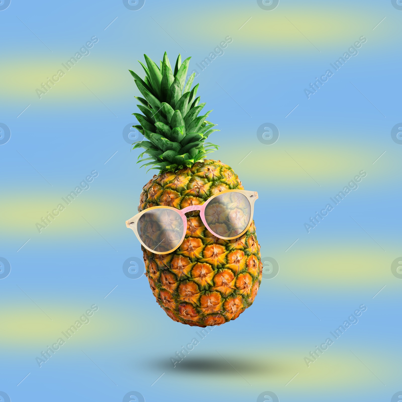 Image of Summer vibe. Pineapple with sunglasses on color background. Party flyer or other seasonal