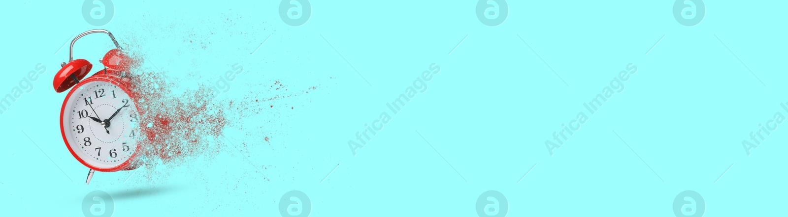 Image of Red alarm clock dissolving on light blue background, banner design with space for text. Flow of time